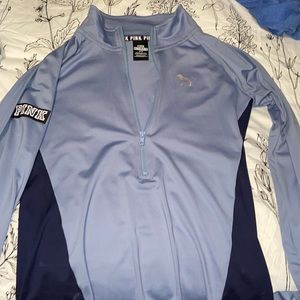 Blue zip up athletic wear top